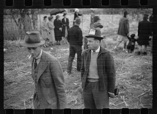 Untitled photo, possibly related to: Photographer and editor of local paper at cornhusking contest, Marshall County, Iowa