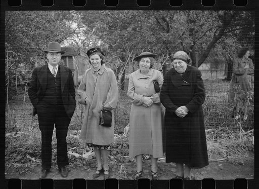 Spectators at cornhusking contest, Marshall County, Iowa