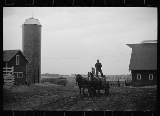 Untitled photo, possibly related to: Wagon with extra-high bangboard used in cornhusking contest, Marshall County, Iowa