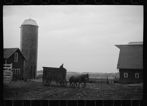 Untitled photo, possibly related to: Wagon with extra-high bangboard used in cornhusking contest, Marshall County, Iowa