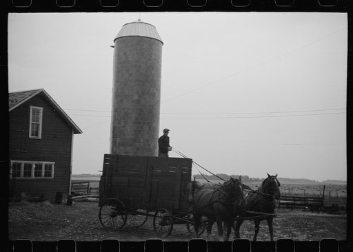 Untitled photo, possibly related to: Wagon with extra-high bangboard used in cornhusking contest, Marshall County, Iowa