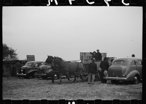 Untitled photo, possibly related to: Wagon with extra-high bangboard used in cornhusking contest, Marshall County, Iowa