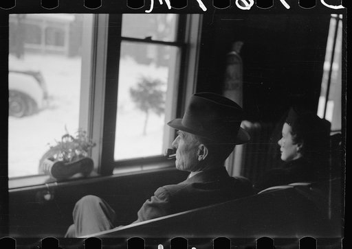 Guests in hotel lobby watching snowstorm, Chillicothe, Ohio