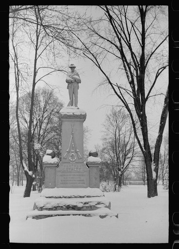 Statue in park after snowstorm, Chillicothe, Ohio