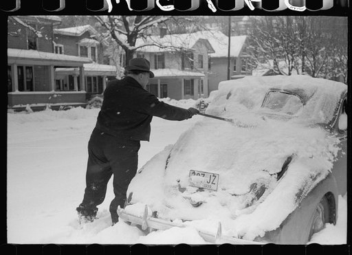 Untitled photo, possibly related to: Man cleans off car, Chillicothe, Ohio