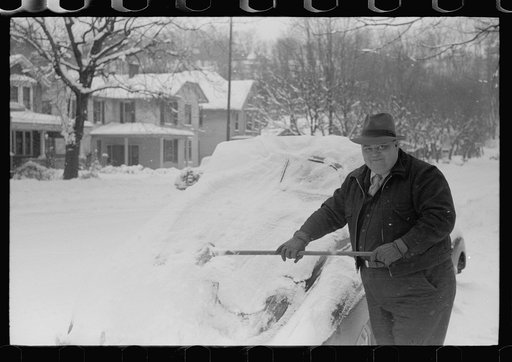 Untitled photo, possibly related to: Man cleans off car, Chillicothe, Ohio