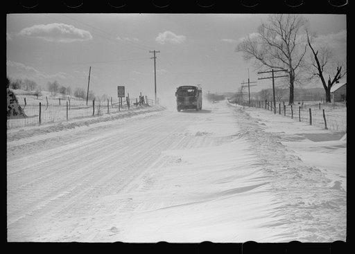Ross County, Ohio. Bus on U.S. Highway snow drifted