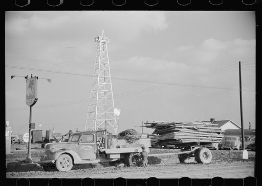 Truck stuck in the mud of oil field, Marion County, Illinois