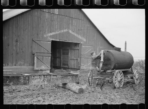 Untitled photo, possibly related to: Farmer with water tank, Parke County, Indiana