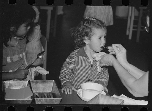 Nursery school, FSA (Farm Security Administration) camp, Sinton, Texas, afternoon feeding time