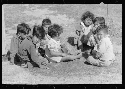 Untitled photo, possibly related to: Migratory worker's child at community store, FSA (Farm Security Administration) camp, Sinton, Texas