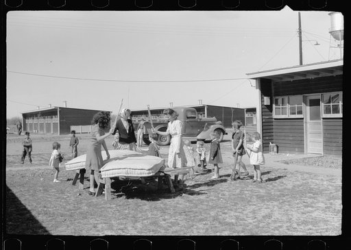 In front of the community store, FSA (Farm Security Administration) camp, Sinton, Texas
