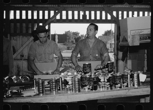 Packing canned grapefruit juice, packing shed, Weslaco, Texas