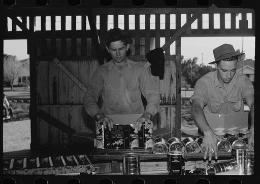Packing canned grapefruit juice, packing shed, Weslaco, Texas