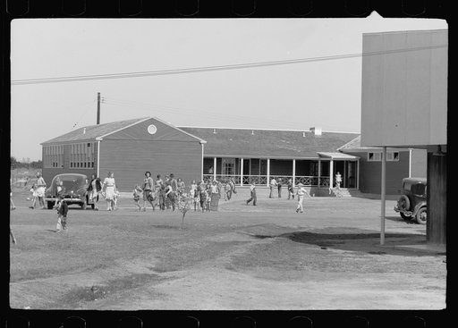 Noonday recess, elementary school, FSA (Farm Security Administration) camp, Weslaco, Texas