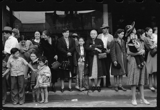 Crowds watching children's parade, part of Charro Days celebration, Brownsville, Texas. Children from the schools in Matamoras, Mexico and from the Brownsville schools participated jointly