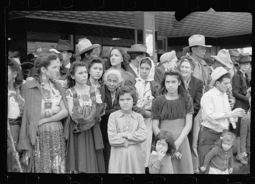 Untitled photo, possibly related to: Crowds watching children's parade, part of Charro Days celebration, Brownsville, Texas. Children from the schools in Matamoras, Mexico and from the Brownsville schools participated jointly