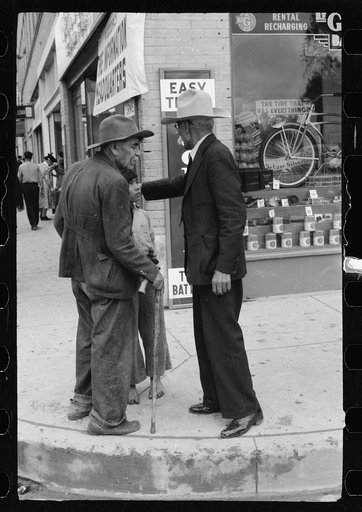 Mexicans on street corner, Brownsville, Texas