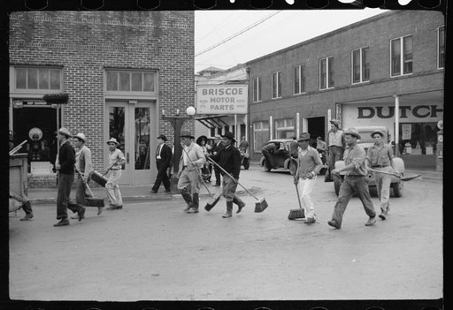 Untitled photo, possibly related to: Street cleaners follow the parade, Charro Days, Brownsville, Texas