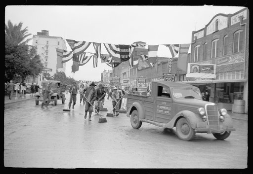 Untitled photo, possibly related to: Street cleaners follow the parade, Charro Days, Brownsville, Texas