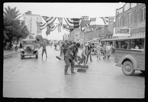 Untitled photo, possibly related to: Street cleaners follow the parade, Charro Days, Brownsville, Texas
