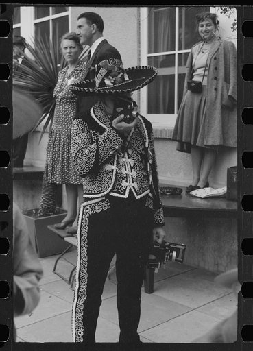 Untitled photo, possibly related to: Tourists watch costume show, Charro Days, Brownsville, Texas