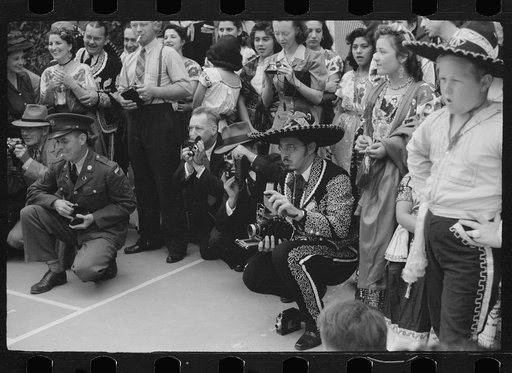 Tourists at costume show, Charro Days, Brownsville, Texas