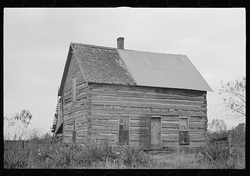 Untitled photo, possibly related to: Home of prospective client whose property has been optioned by the government, Brown County, Indiana. The elderly couple who occupy this house will be moved to new land when their property has been purchased by the government