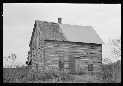 Home of prospective client whose property has been optioned by the government, Brown County, Indiana. The elderly couple who occupy this house will be moved to new land when their property has been purchased by the government