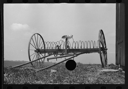 Untitled photo, possibly related to: Hayrake on farm near the Greenhills Project, Cincinnati, Ohio