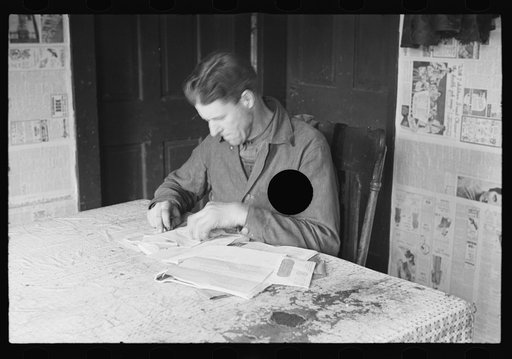 Untitled photo, possibly related to: Rehabilitation client worrying over his accounts, Jackson County, Ohio