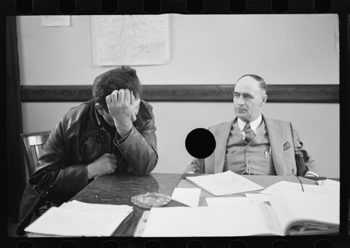 Untitled photo, possibly related to: Rehabilitation client worrying over his accounts, Jackson County, Ohio