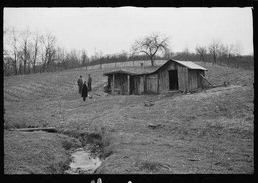 Untitled photo, possibly related to: Resettlement Administration representative at door of rehabilitation client's house, Jackson County, Ohio