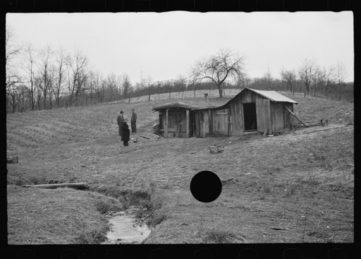 Untitled photo, possibly related to: Resettlement Administration representative at door of rehabilitation client's house, Jackson County, Ohio