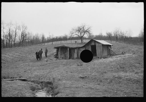 Untitled photo, possibly related to: Resettlement Administration representative at door of rehabilitation client's house, Jackson County, Ohio