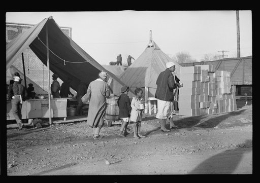 Untitled photo, possibly related to: Mess line at the camp at Forrest City, Arkansas
