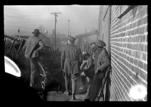 Untitled photo, possibly related to: Lined up and waiting for a meal in the camp for Negro flood refugees at Forrest City, Arkansas