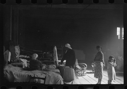Untitled photo, possibly related to: Interior of cotton compress at Forrest City, Arkansas where sick Negro refugees from flood of 1937 are housed