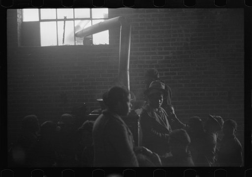 Untitled photo, possibly related to: Interior of cotton compress at Forrest City, Arkansas where sick Negro refugees from flood of 1937 are housed