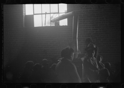Untitled photo, possibly related to: Interior of cotton compress at Forrest City, Arkansas where sick Negro refugees from flood of 1937 are housed