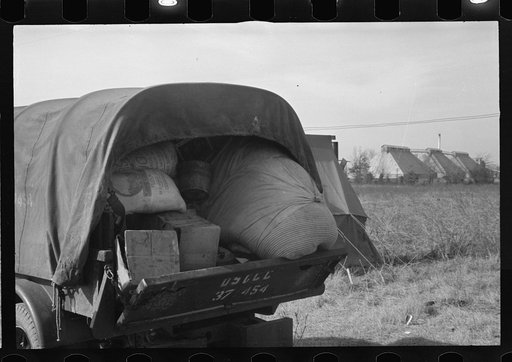 Untitled photo, possibly related to: Awaiting registration in the camp for Negro flood refugees at Forrest City, Arkansas
