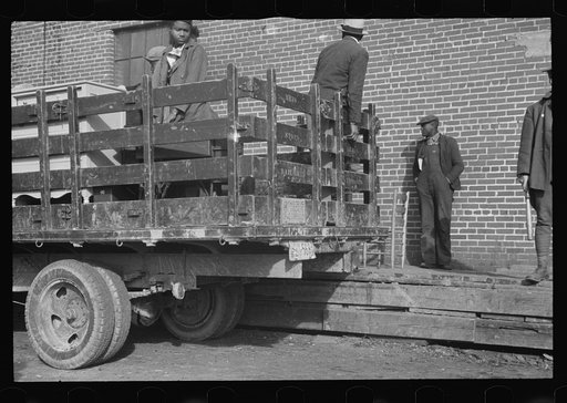 Untitled photo, possibly related to: Awaiting registration in the camp for Negro flood refugees at Forrest City, Arkansas