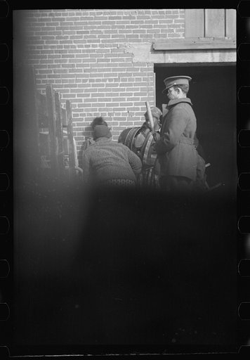 Untitled photo, possibly related to: Awaiting registration in the camp for Negro flood refugees at Forrest City, Arkansas
