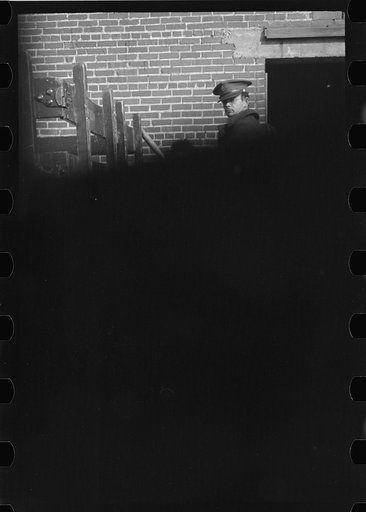 Untitled photo, possibly related to: Negro flood refugees wearing identification tags after registration in the concentration camp at Forrest City, Arkansas