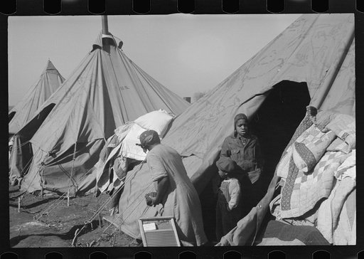 Untitled photo, possibly related to: A street of tents in the camp for flood refugees at Forrest City, Arkansas