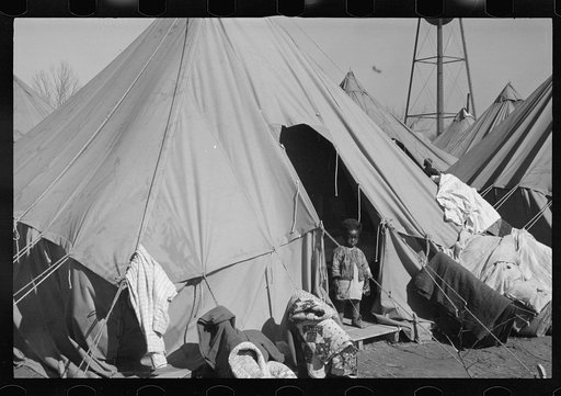 Young flood refugee in the camp at Forrest City, Arkansas