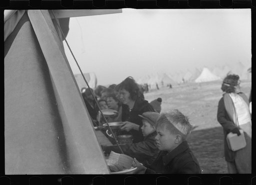 Untitled photo, possibly related to: Part of the mess line in the camp for white flood refugees, Forrest City, Arkansas