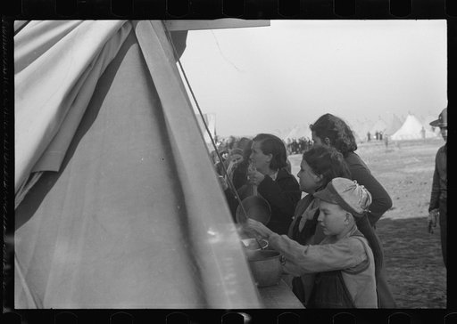Untitled photo, possibly related to: Part of the mess line in the camp for white flood refugees, Forrest City, Arkansas