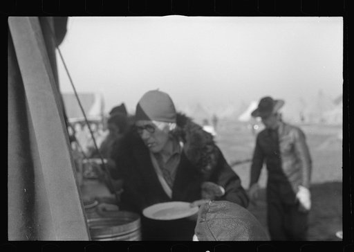 Untitled photo, possibly related to: Part of the mess line in the camp for white flood refugees, Forrest City, Arkansas