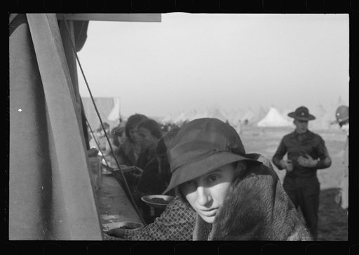 Untitled photo, possibly related to: Part of the mess line in the camp for white flood refugees, Forrest City, Arkansas